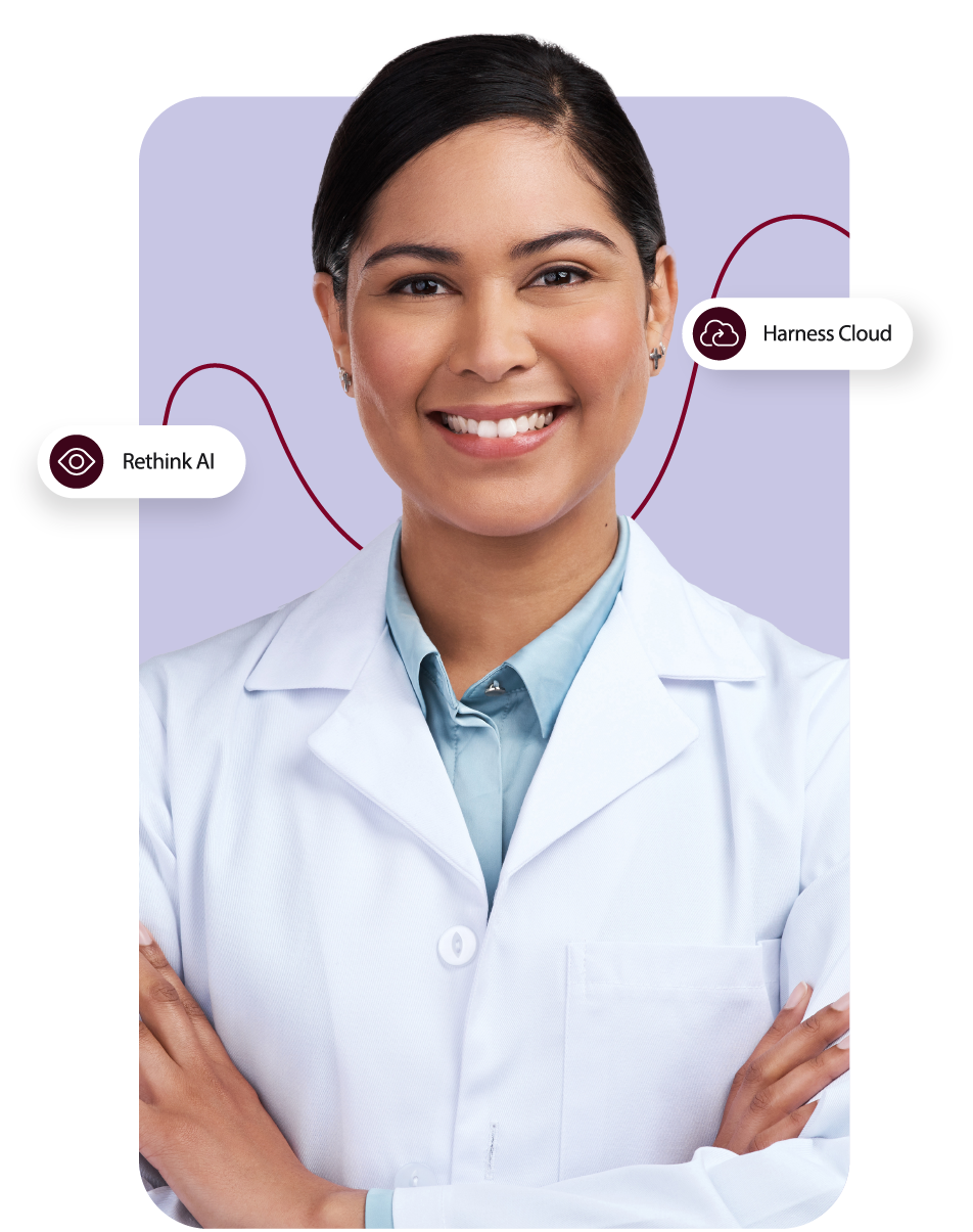 A smiling person wearing a white lab coat stands with arms crossed against a light purple background. Text labels pointing to the person read 
